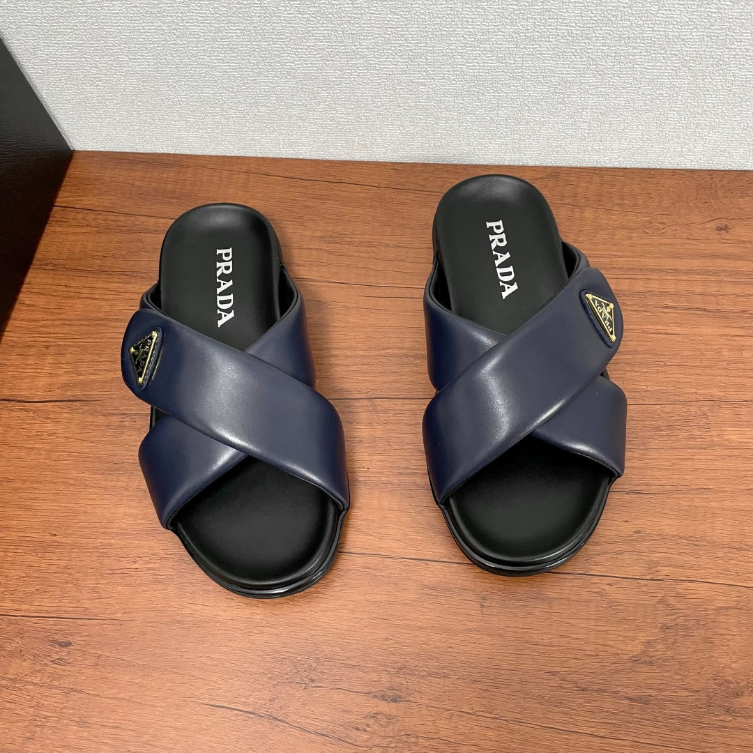 Prada navy slide sandals, wide straps with logo plaque, black footbed