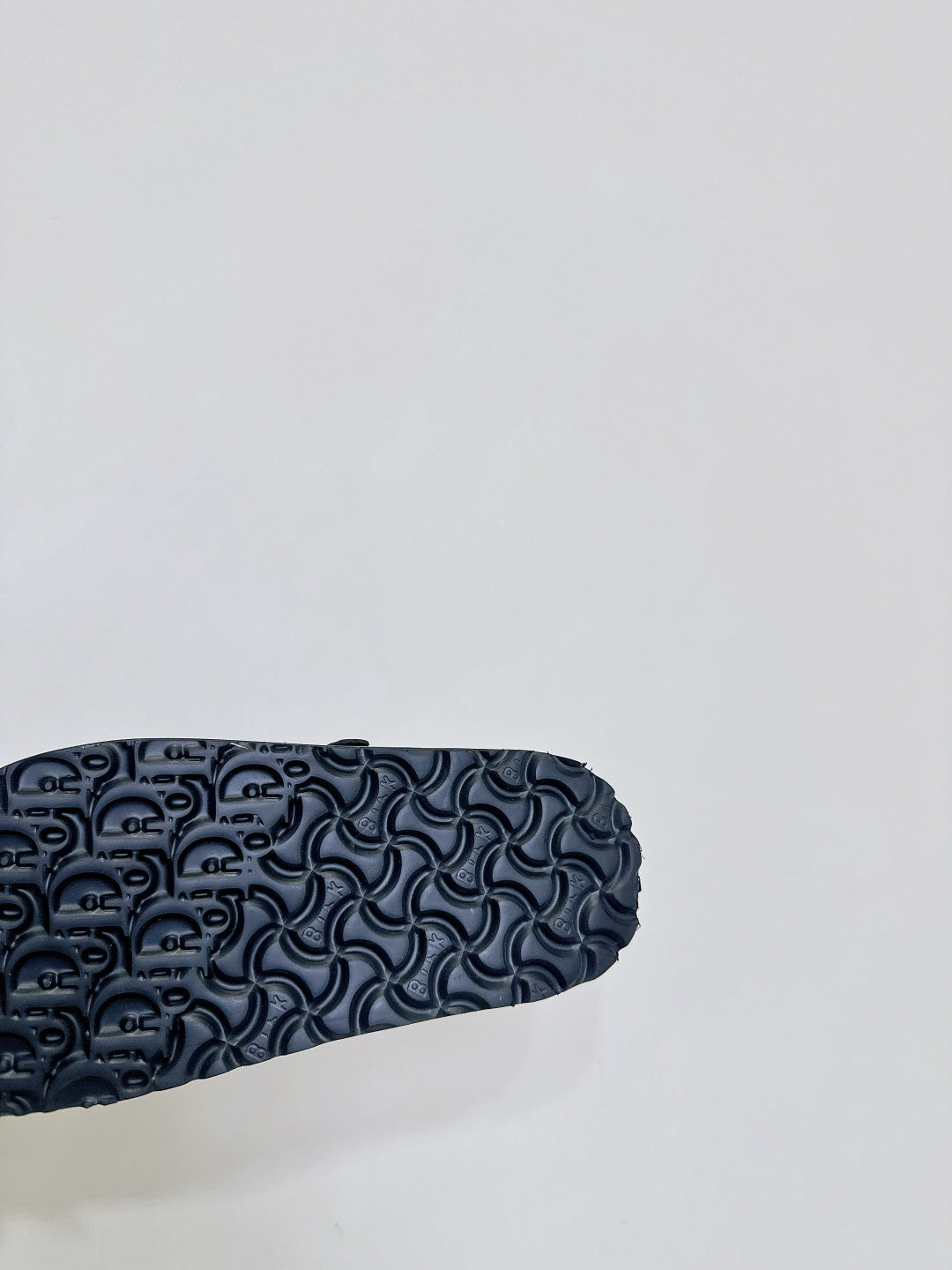 Dior sandals outsole, dark textured rubber tread underside