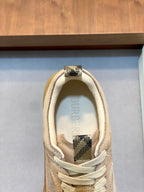 Burberry beige sneaker tongue with checkered inner label and lace-up front