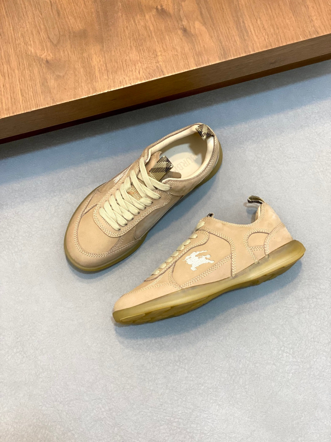 Burberry low-top sneakers, beige leather with lace-up and white logo on side