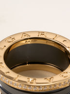 Gold ring interior with engraved letters and dark lining, close-up