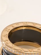 Gold-tone ring interior showing “ITALY 54” engraving and pavé stones