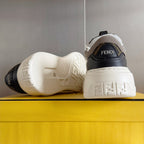 Fendi unisex sneakers rear view, white midsoles with black heel detail on yellow box