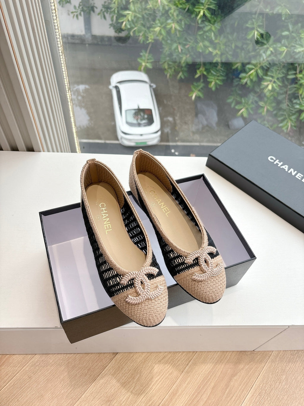 Chanel pair of woven ballet flats with black knit detail and braided bow, beige uppers