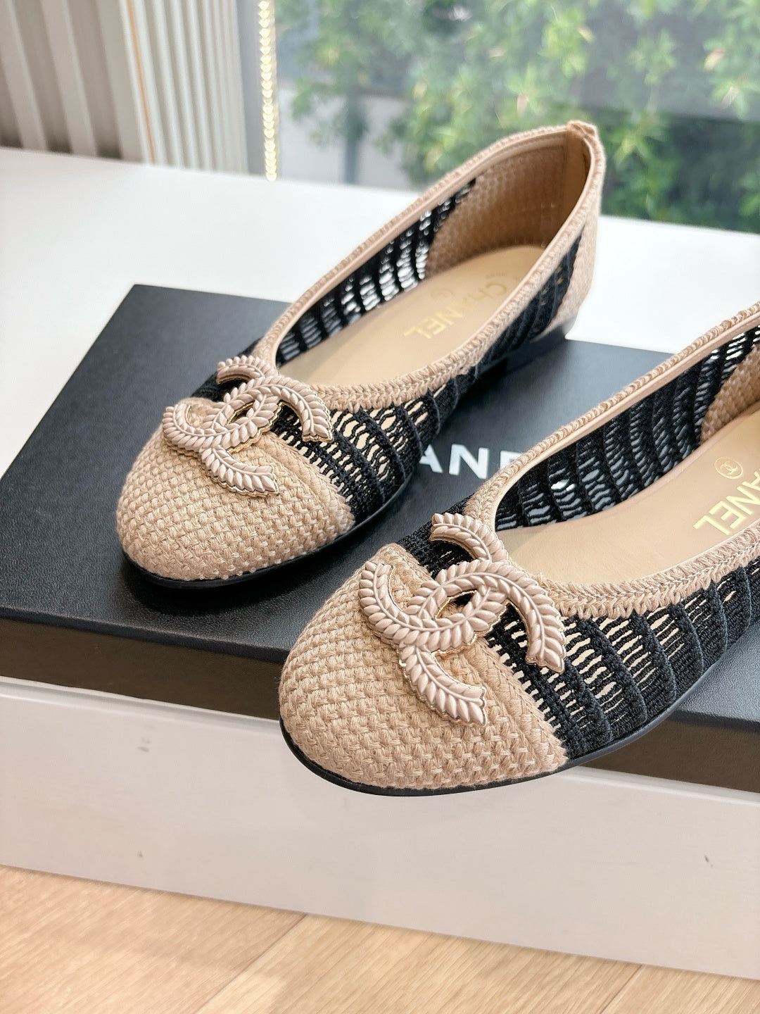 Chanel beige woven ballet flats with black knit stripe and braided bow detail