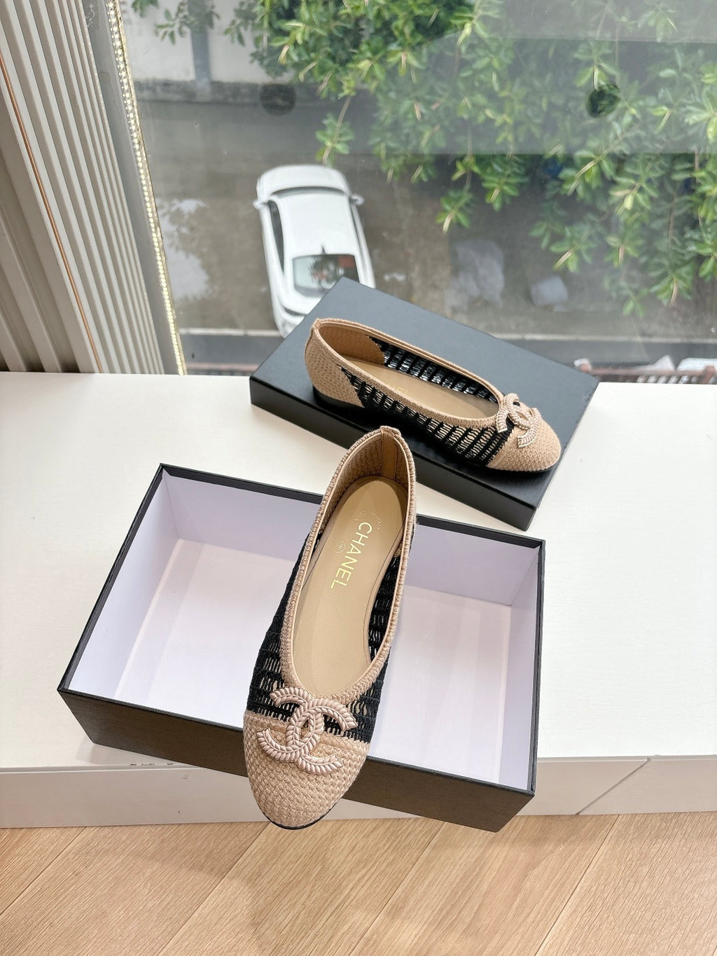 Chanel woven ballet flats with black knit trim and braided bow detail, beige uppers