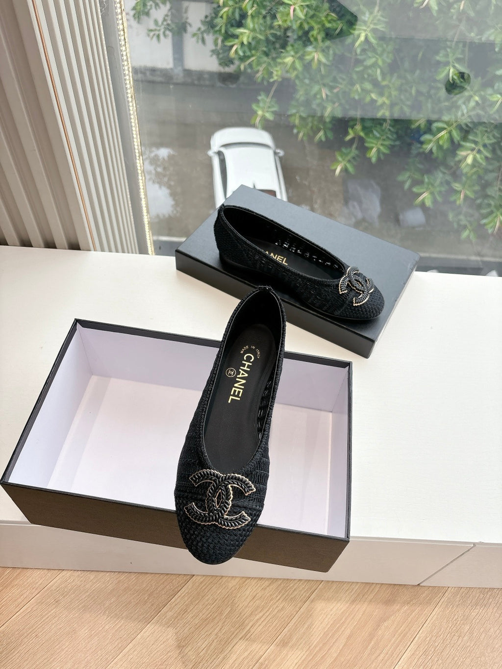 Black Chanel knit slip-on flats, CC logo embroidery on front and side
