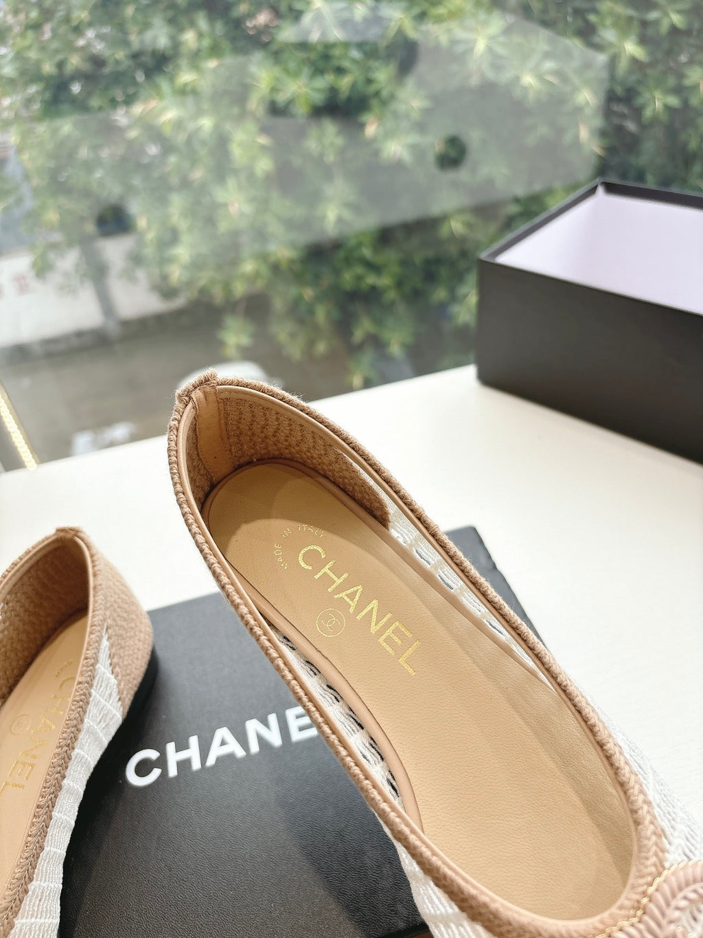 Chanel ladies beige woven ballet flats, close-up of interior label