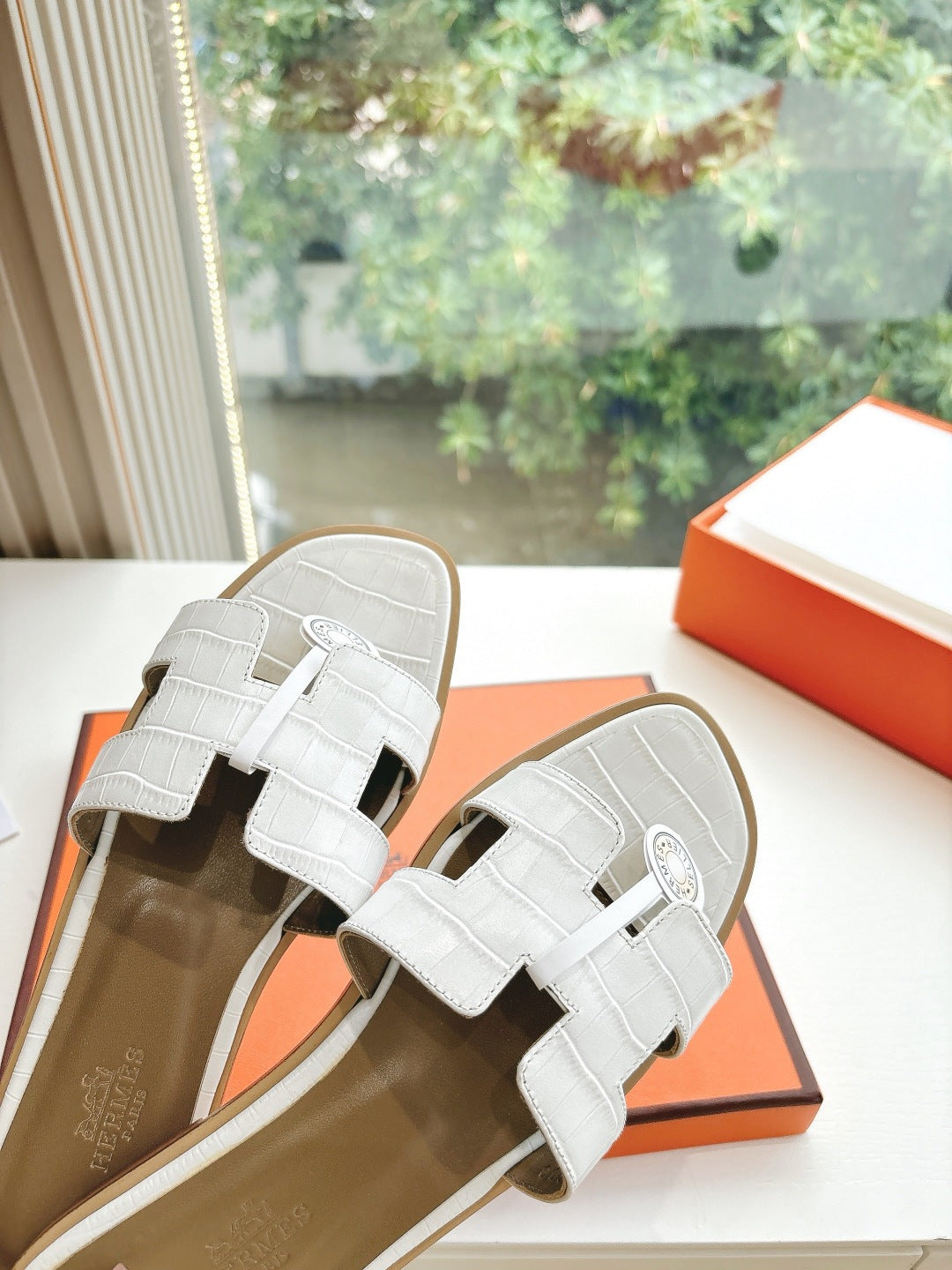 Hermes ladies' slide sandals, white with double straps and round logo detail