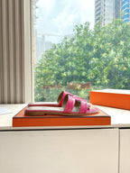 Hermes pink croc-pattern slide sandal, single pair on box