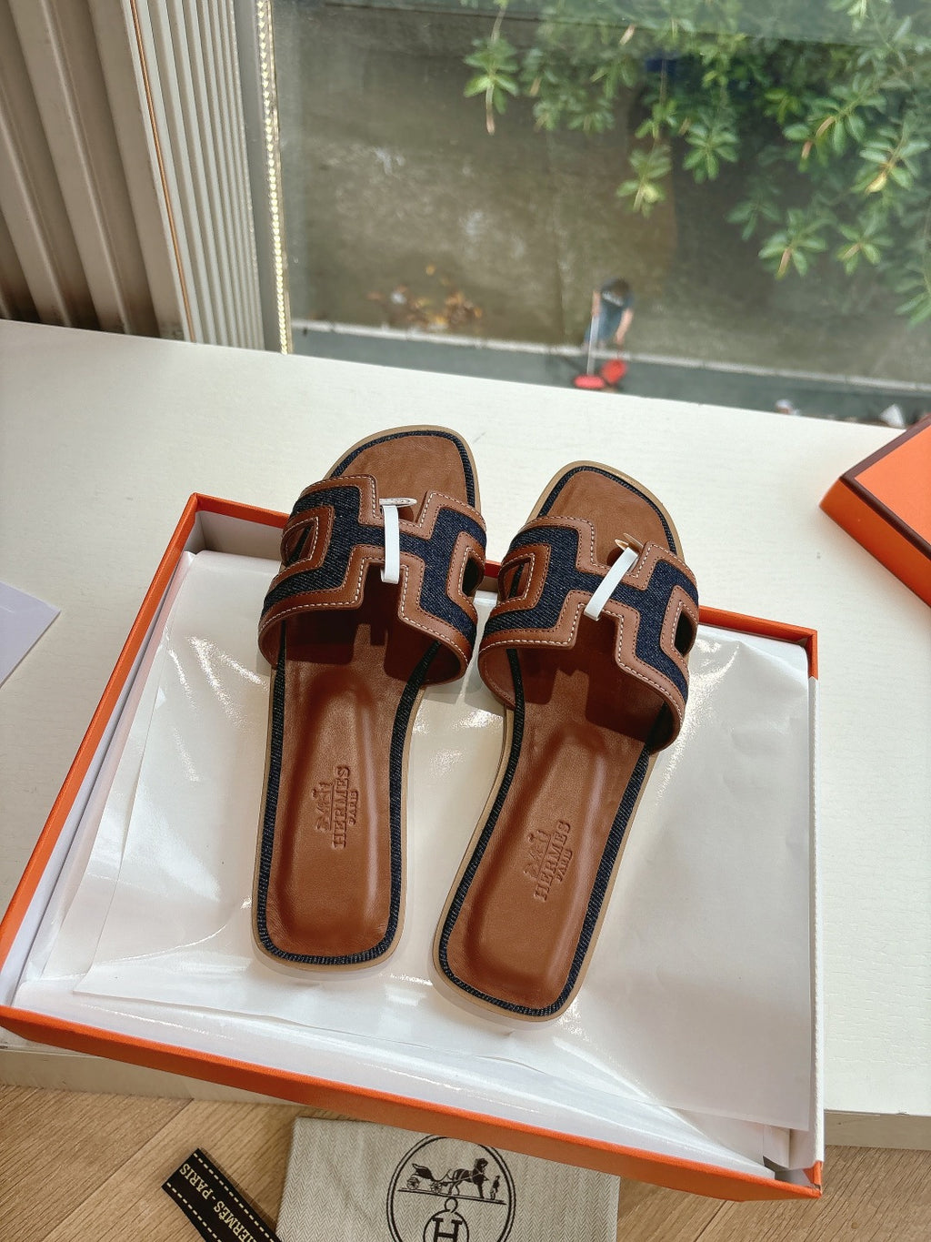 Hermes ladies mule sandals, brown leather with geometric strap pattern and logo medallion