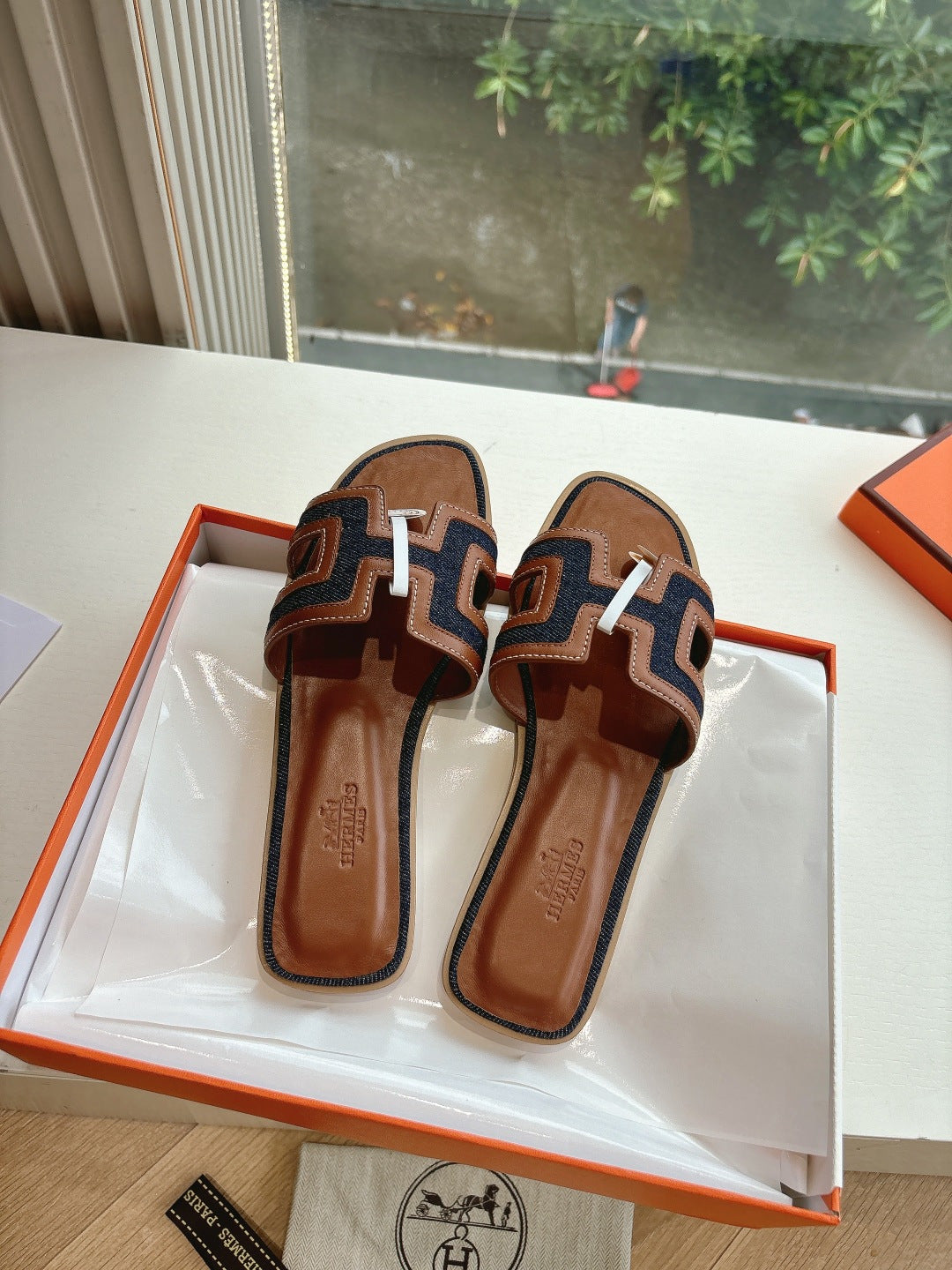 Hermes ladies mule sandals, brown leather with geometric strap pattern and logo medallion