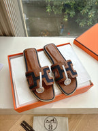 Hermes ladies mule sandals in brown leather with geometric dark and white trim