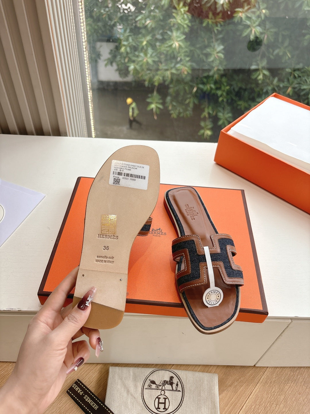 Hermes ladies mule sandals with tan footbed and brown upper, dark and white geometric trim