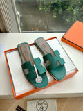 Hermes ladies sandals, teal green slide with H-style strap and white contrast lining