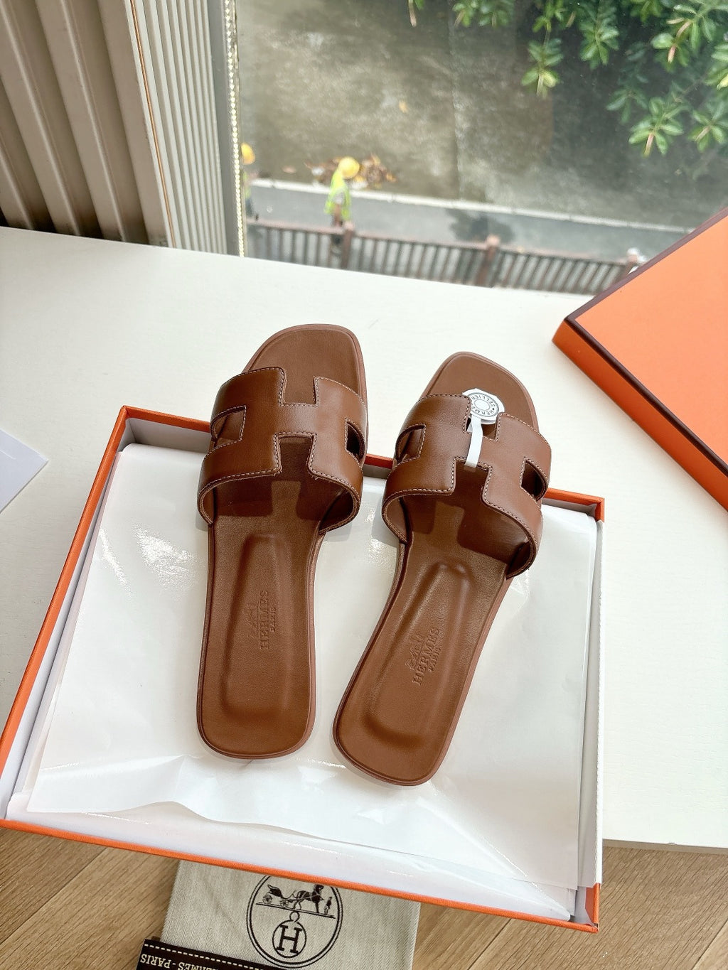 Hermes women's brown leather slide sandals, two strap design, open toe