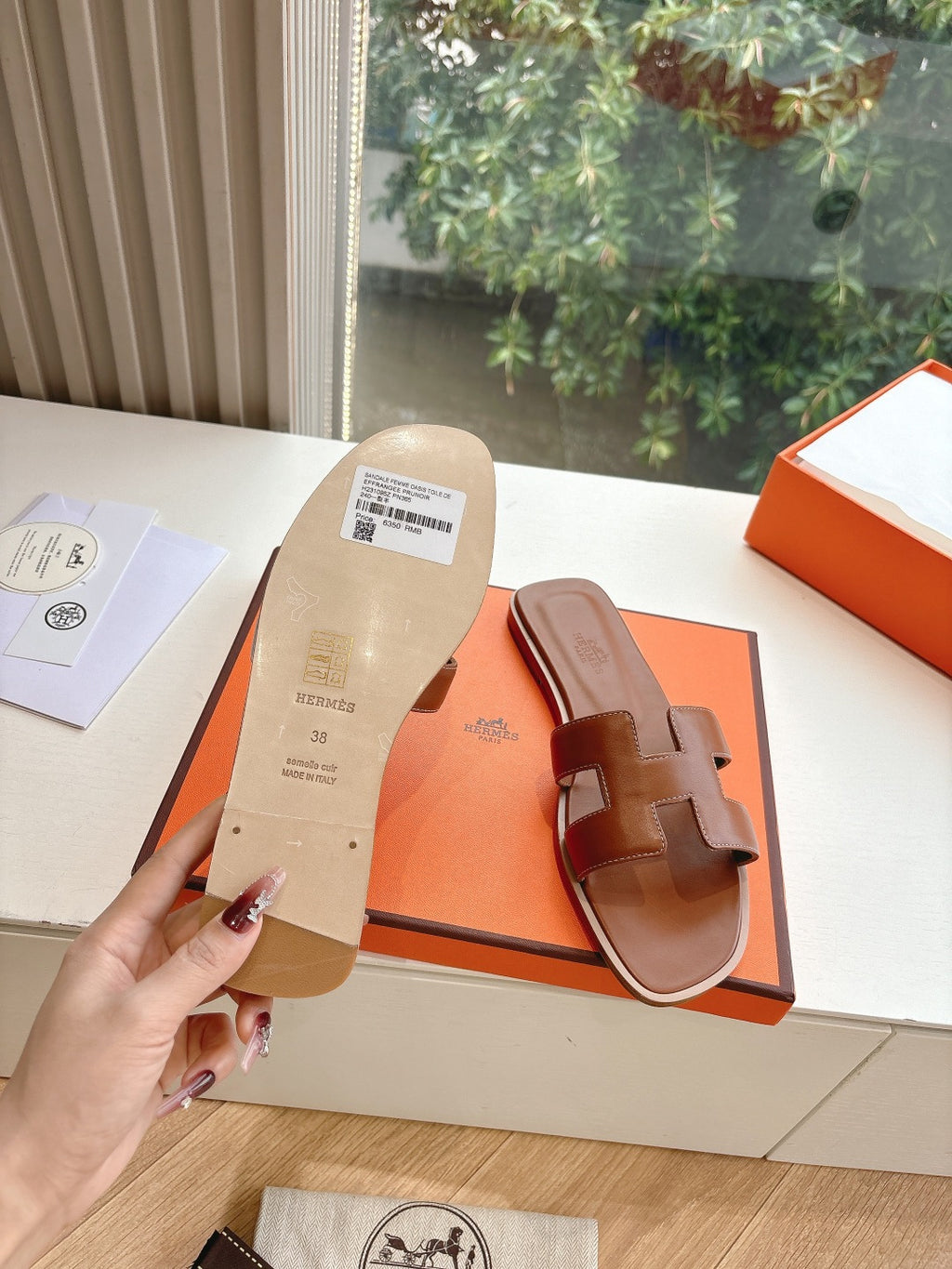 Hermes leather sandal sole and footbed view with size tag, brown