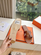 Hermes leather sandal sole and footbed view with size tag, brown