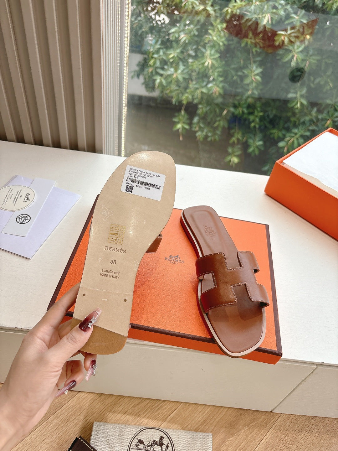 Hermes leather sandal sole and footbed view with size tag, brown