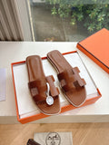 Hermes leather slide sandals with wide ankle straps, brown