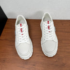 Unisex sneakers, white textured uppers, lace-up, thick white rubber sole