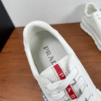 Unisex sneakers, white interior view with Prada wordmark on the insole