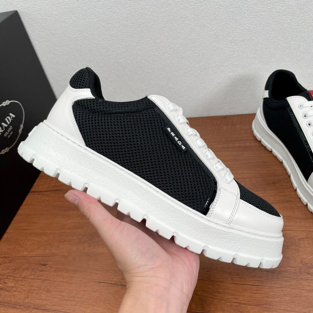 Prada unisex sneakers, black mesh side with white leather trim, lace-up, thick sole