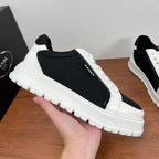 Prada unisex sneakers, black mesh side with white leather trim, lace-up, thick sole