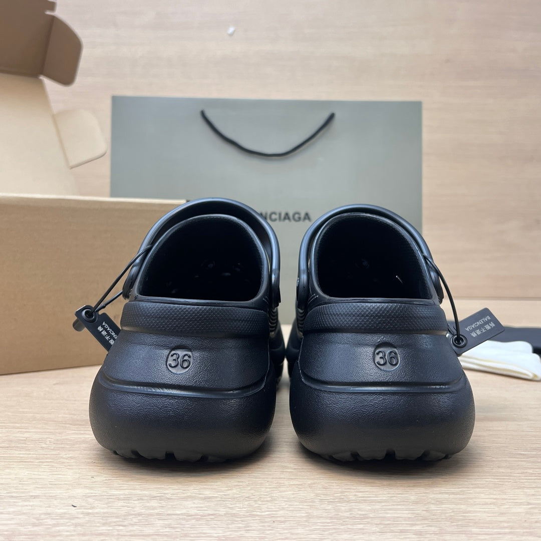 Black Balenciaga clogs, rear view with size 36 stamp and pull tabs
