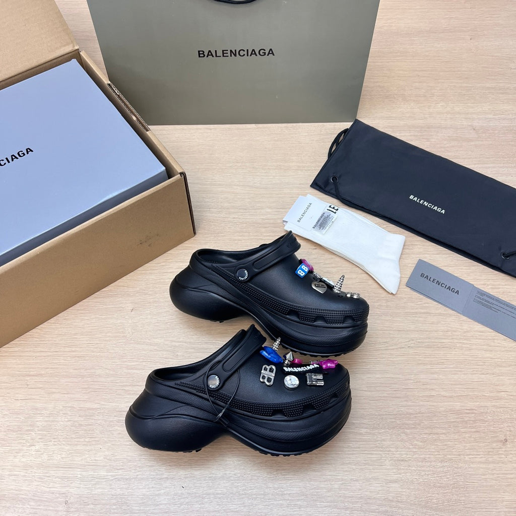 Black Balenciaga clogs and slide sandals set, with charm decorations