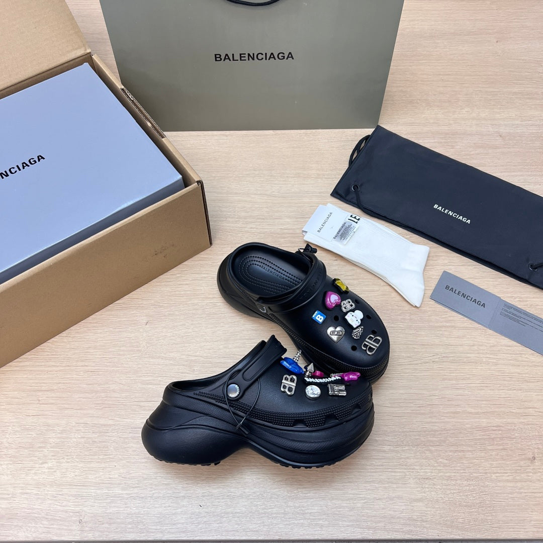 Black Balenciaga sandals and slide sandals set, with colorful charm accents