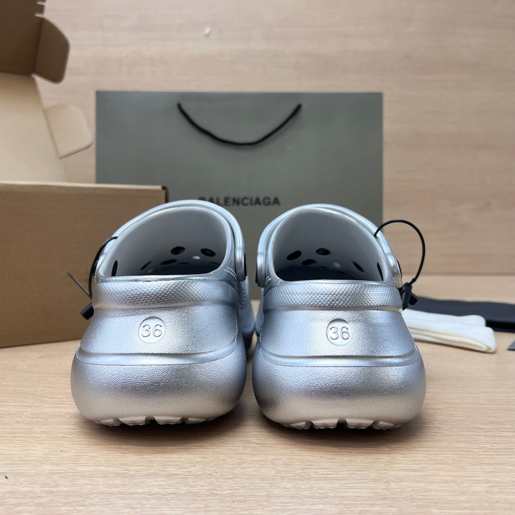 Back view of silver slide clogs showing size 36 marks and looped heel straps