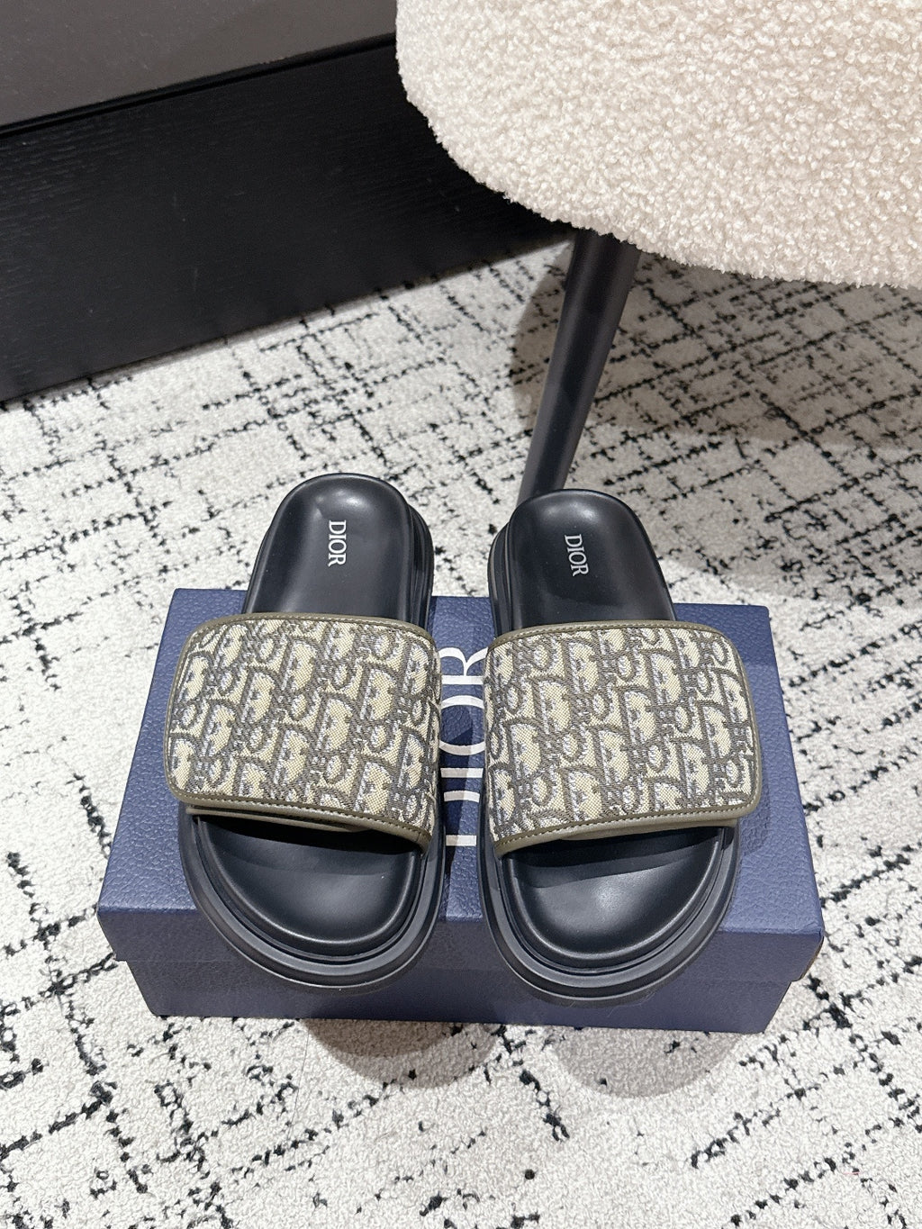 Dior slide sandals with beige Dior Oblique-print strap and black contoured sole