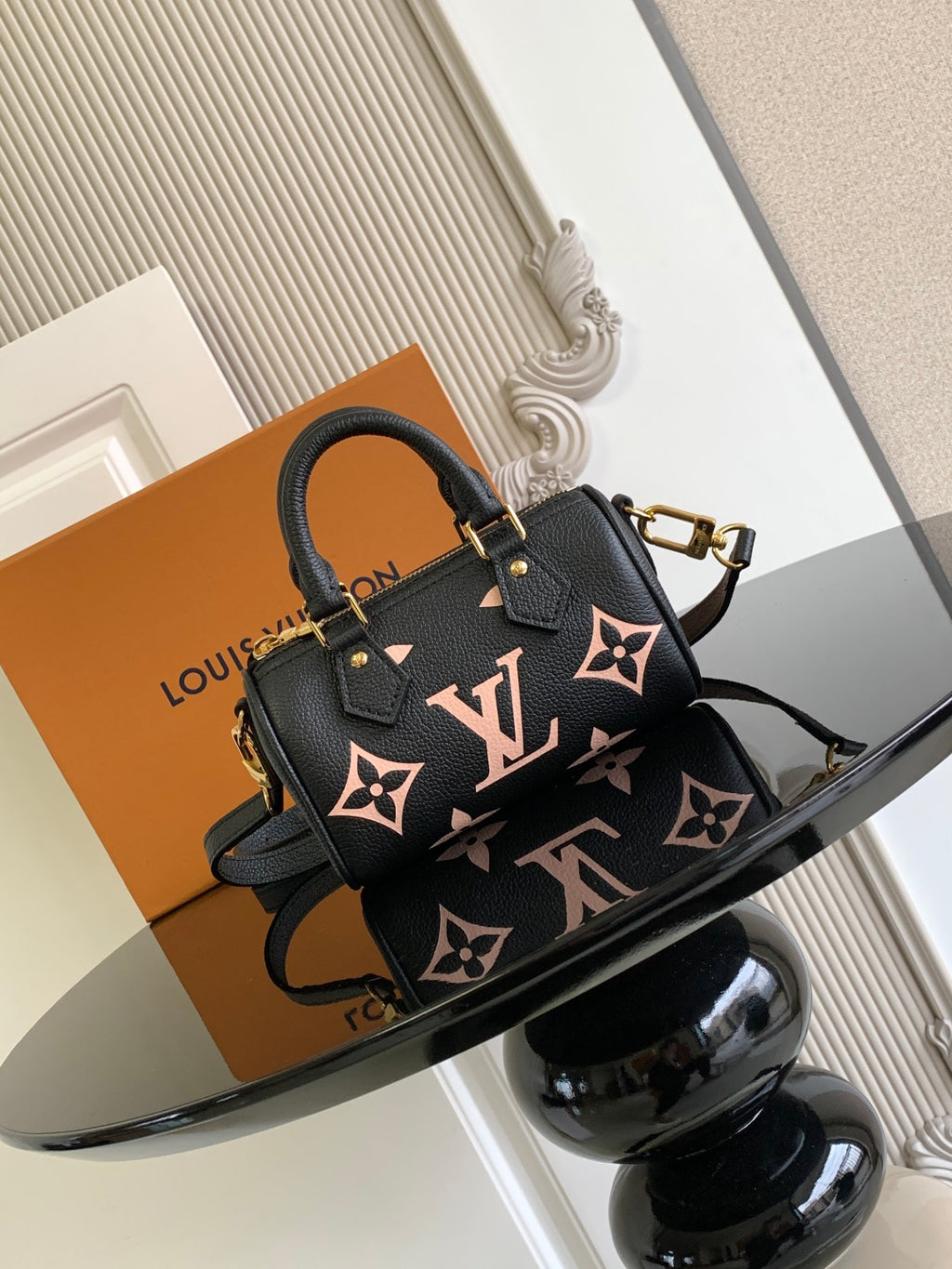 Louis Vuitton black monogram crossbody bag with gold hardware and top handle