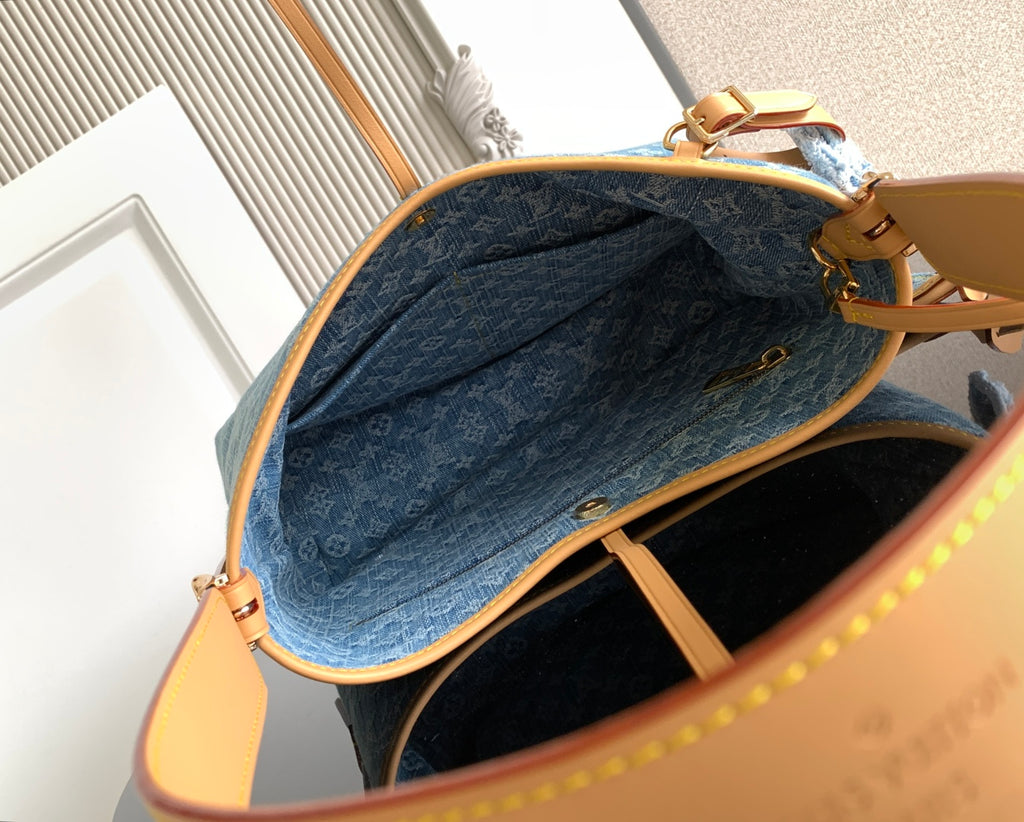Louis Vuitton monogram tote bag open top with blue interior and tan trim