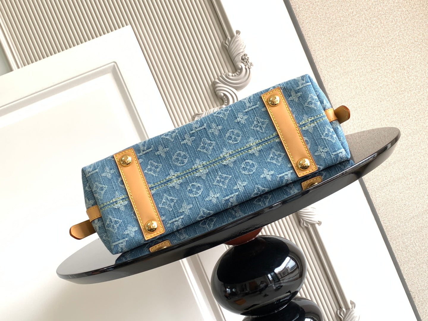 Louis Vuitton monogram tote bag with blue canvas flap and tan leather straps