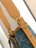 Louis Vuitton monogram tote strap buckle with tan leather and yellow edge stitching