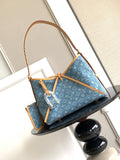 Louis Vuitton monogram tote bag with blue canvas, tan handles, and shoulder strap
