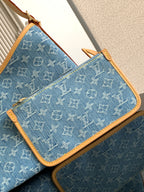 Louis Vuitton monogram zip pouch in blue canvas with tan zipper trim and edges
