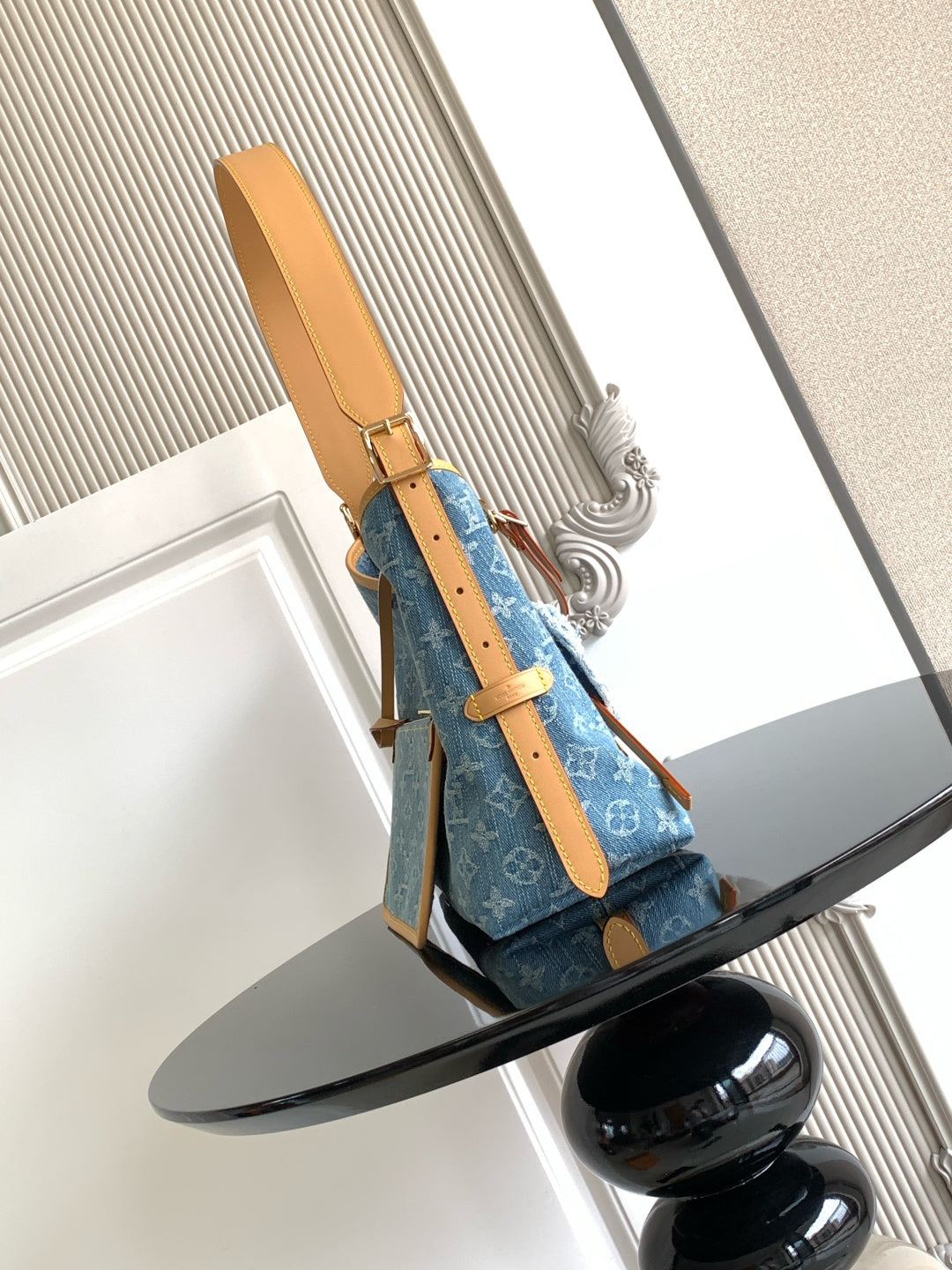 Louis Vuitton monogram tote bag with blue canvas and tan adjustable strap