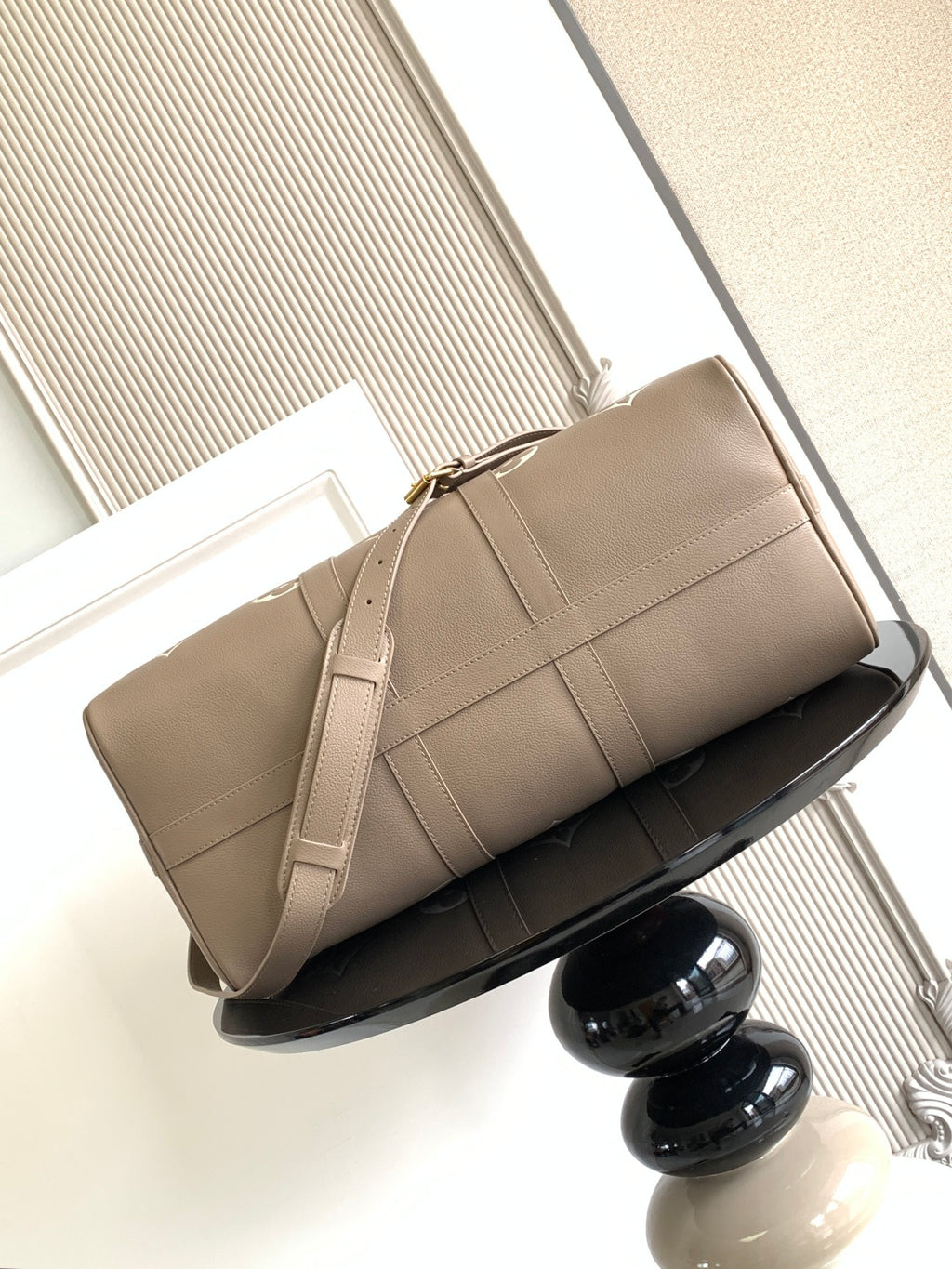 Louis Vuitton bag in taupe with smooth paneling and wide top handle strap