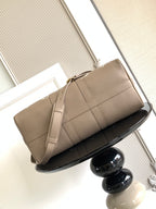 Louis Vuitton bag in taupe with smooth paneling and wide top handle strap