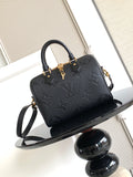 Louis Vuitton monogram handbag in dark navy/black with top handles and shoulder strap