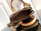 Louis Vuitton monogram bag open top showing interior and gold zipper pulls