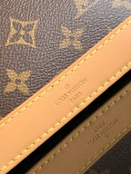 Louis Vuitton monogram bag with Louis Vuitton Paris label on tan leather trim