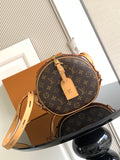 Louis Vuitton monogram round crossbody bag with tan leather trim