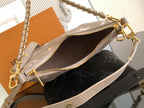 Louis Vuitton monogram bag open interior with zipper and patterned lining