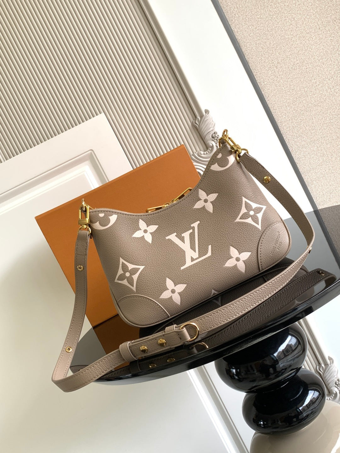 Louis Vuitton monogram crossbody bag with detachable strap and front pocket