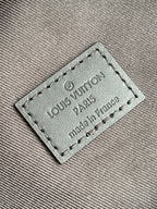 Louis Vuitton Paris leather tag on monogram backpack, made in France