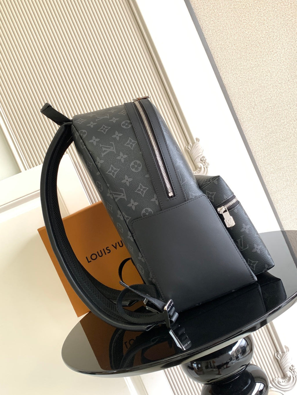 Louis Vuitton monogram backpack with side handle and front zipper